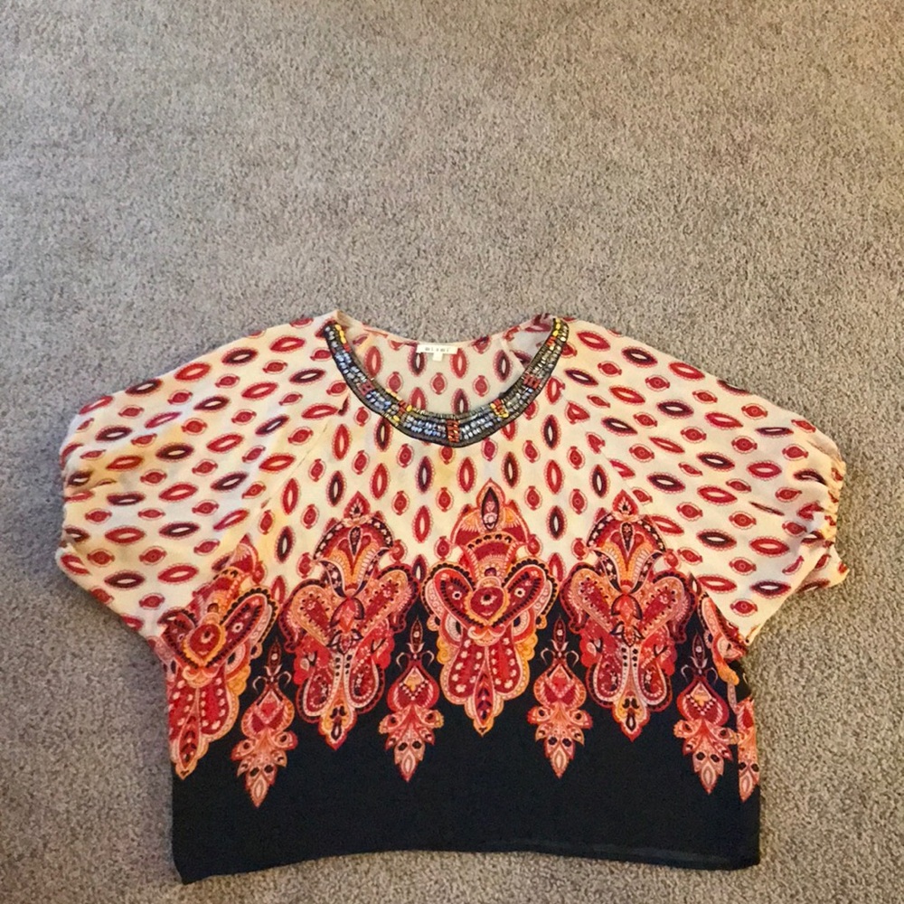 Francesca’s beaded & patterned top, size L.
